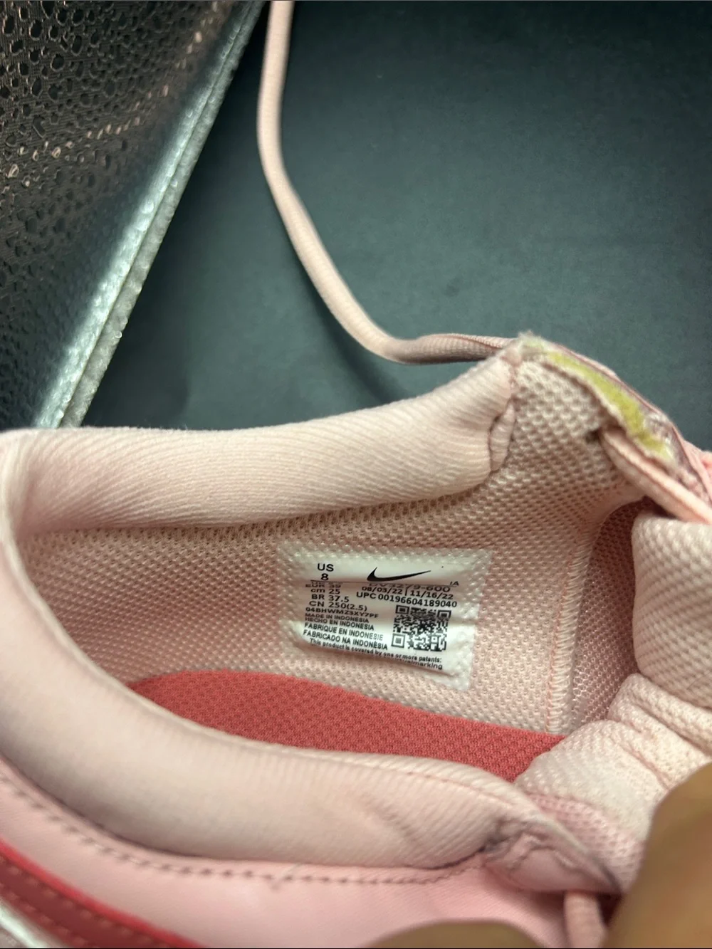 Nike Women's Low-Top Sneakers in Blush with Coral Swoosh